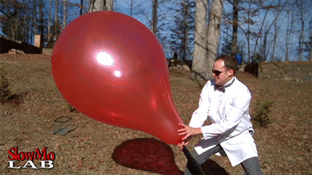 Гифка Взрыв воздушного шарика в замедленной съемке