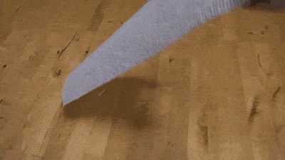 Гифка Кот под листом бумаги