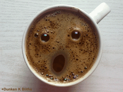 Гифка Лицо в чашке кофе