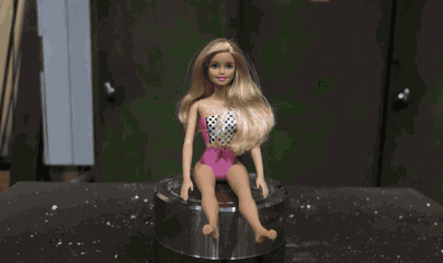Гифка Кукла Барби под прессом
