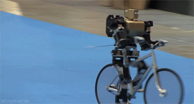 Гифка Робот на велосипеде