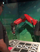 Гифка Робот играет в крестики-нолики