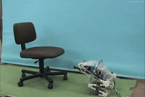 Гифка Робот-лягушка запрыгивает на кресло