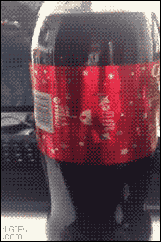 Гифка Новогодняя упаковка Кока-Колы